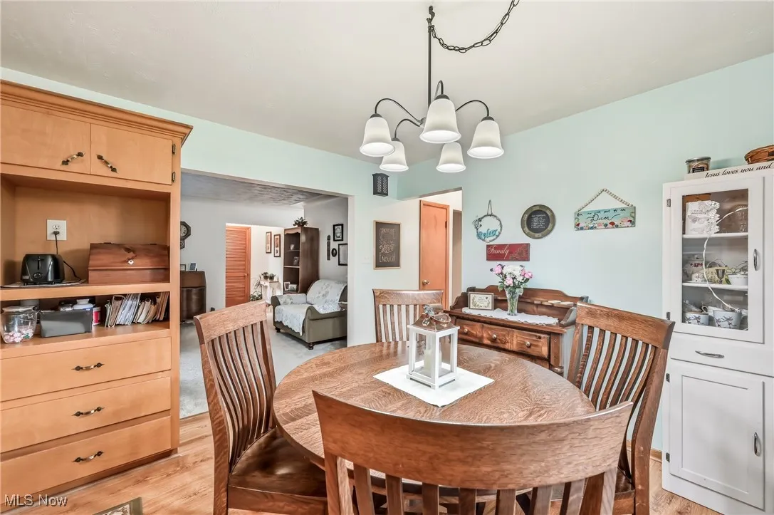 Cozy corner view of the dining area, featuring an open concept that connects easily to the kitchen and the main living areas.