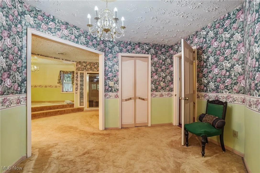Sitting room in the 1st master suite between bedroom and bathroom