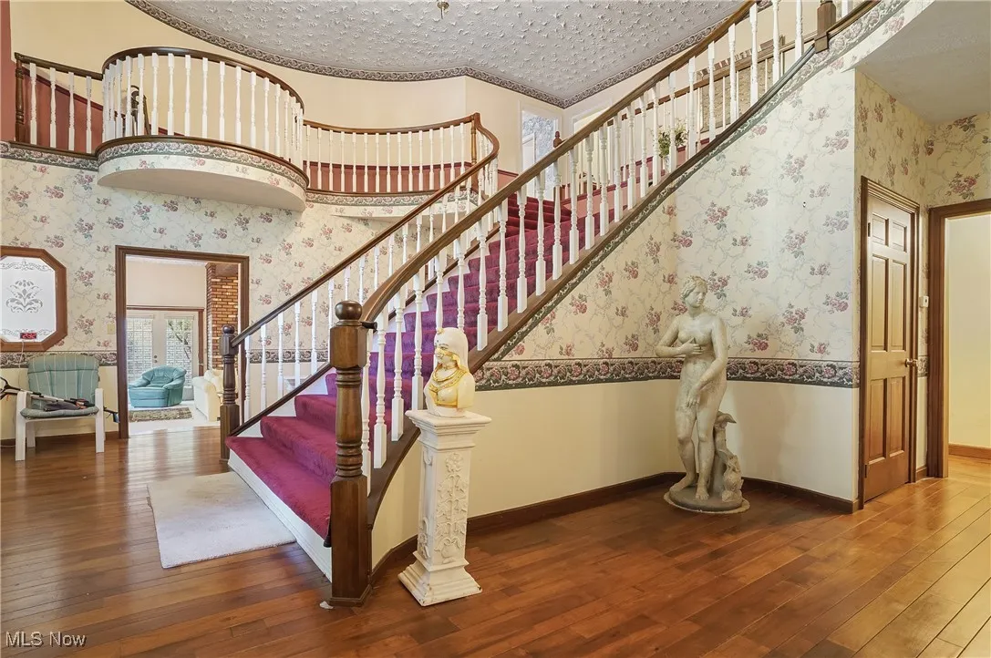 Massive entry with Juliet balconies on each side