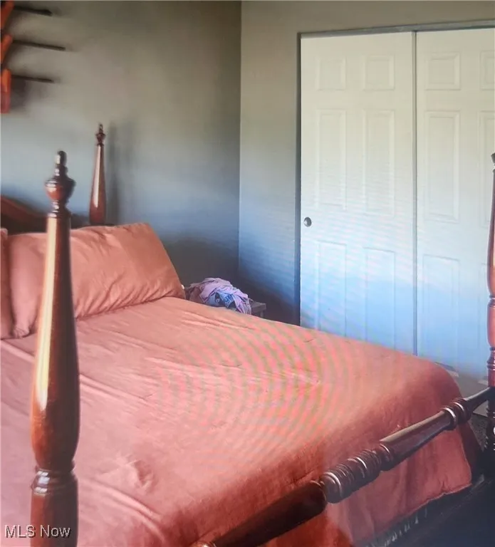 Bedroom featuring a closet