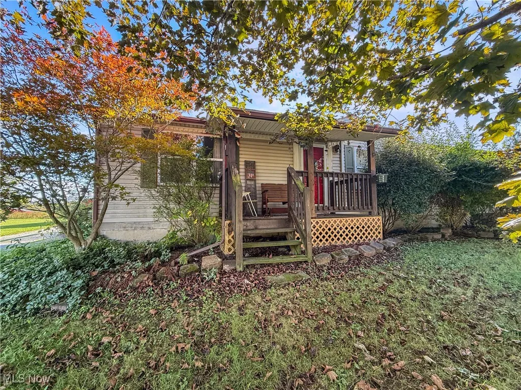View of front of property with a deck