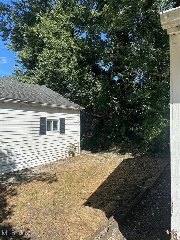 Between garage and side door