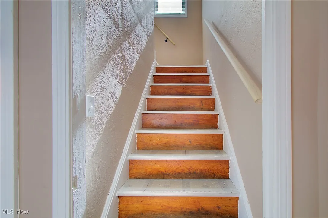 Stairs with a textured wall