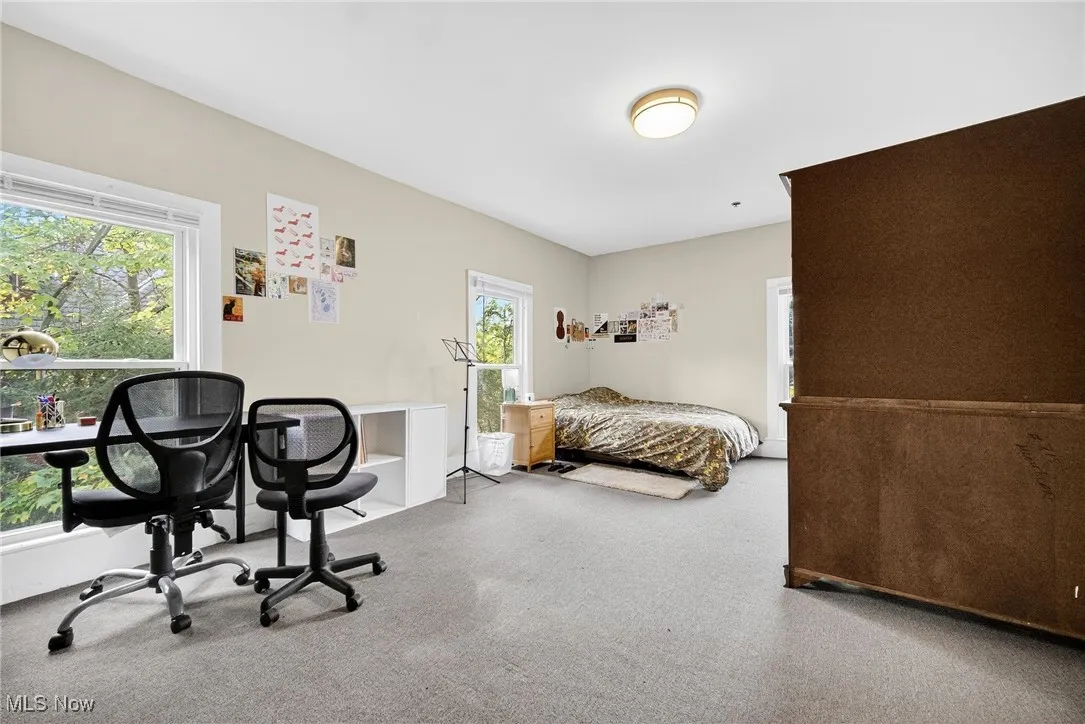 Bedroom featuring carpet