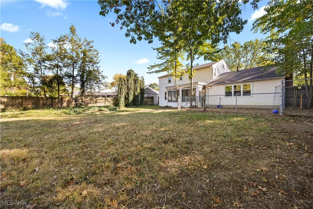 View of fenced backyard