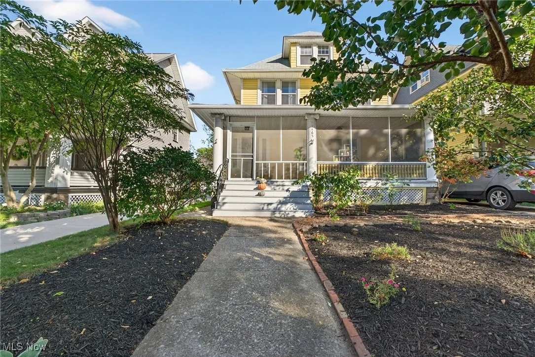 Traditional style home featuring a sunroom