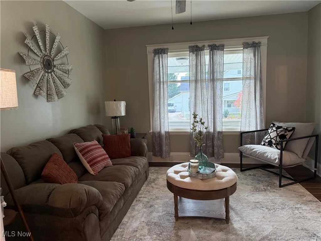 Living area featuring wood finished floors and a ceiling​​‌​​​​‌​​‌‌​‌‌​​​‌‌​‌​‌​‌​​​‌​​ fan