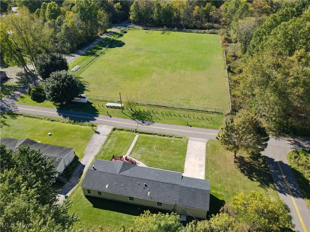 Front of the house looks out to the community baseball field.