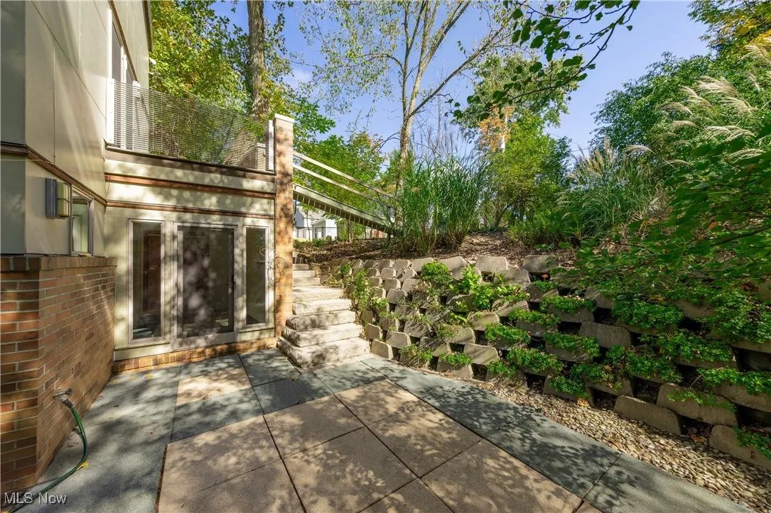 View of patio with stairs