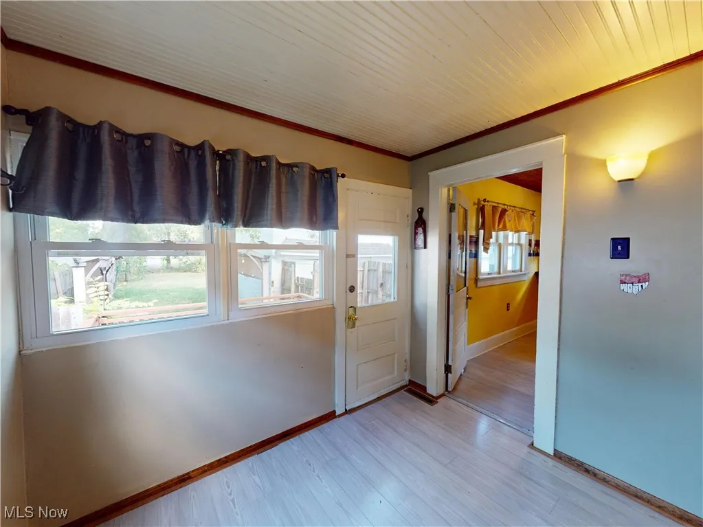 Mud room/Sun room. Your choice. Backdoor to the deck and yard.