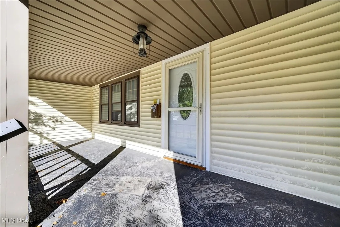 Entrance to property with covered porch