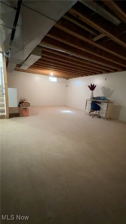 Below grade area featuring stairway