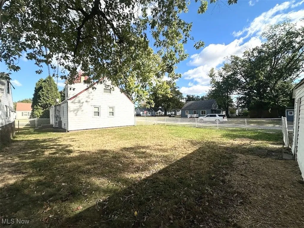View of fenced backyard