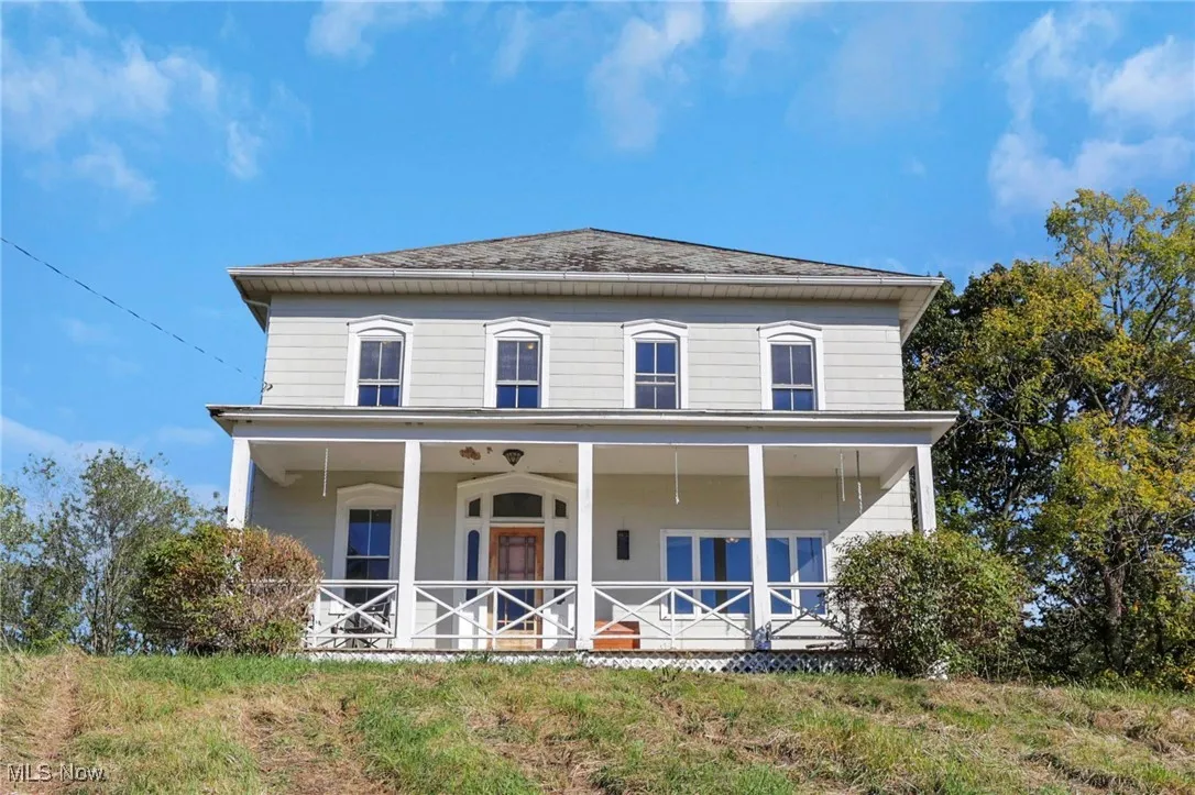 View of front of property with a porch