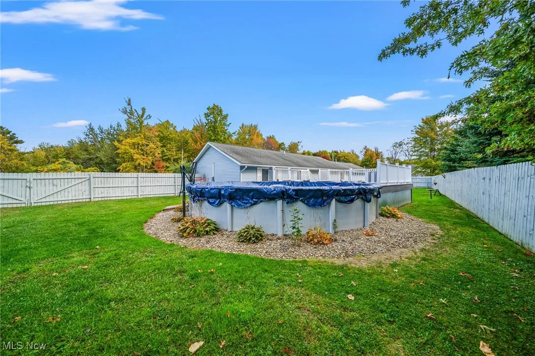 View of swimming pool featuring a fenced backyard