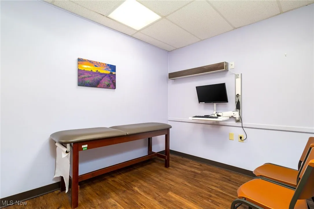 Home office with a drop ceiling