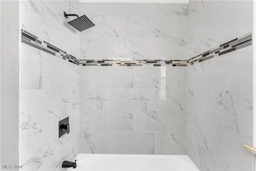 Bathroom featuring  shower combination