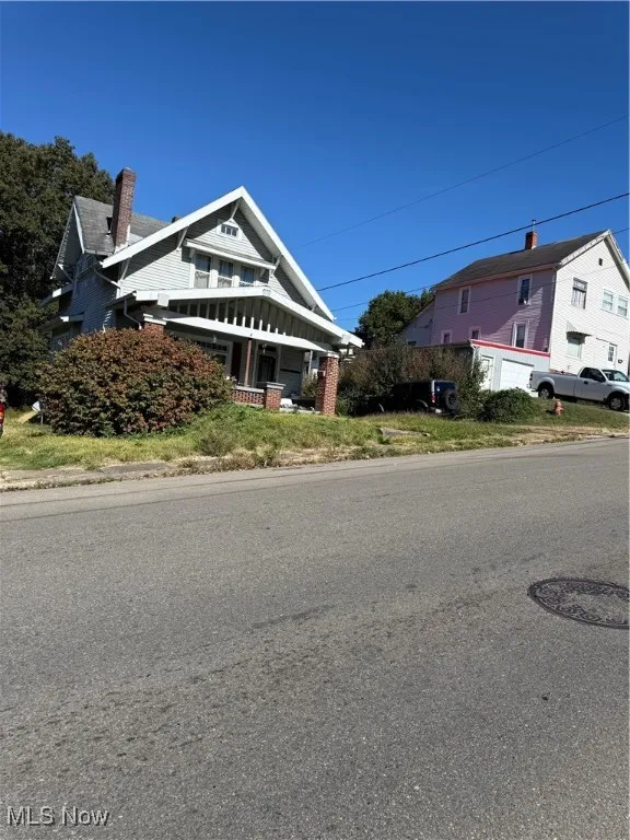 View of front facade featuring covered porch