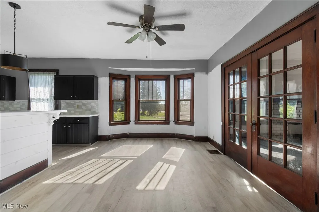 Dining area with light wood style flooring and plenty of natural light