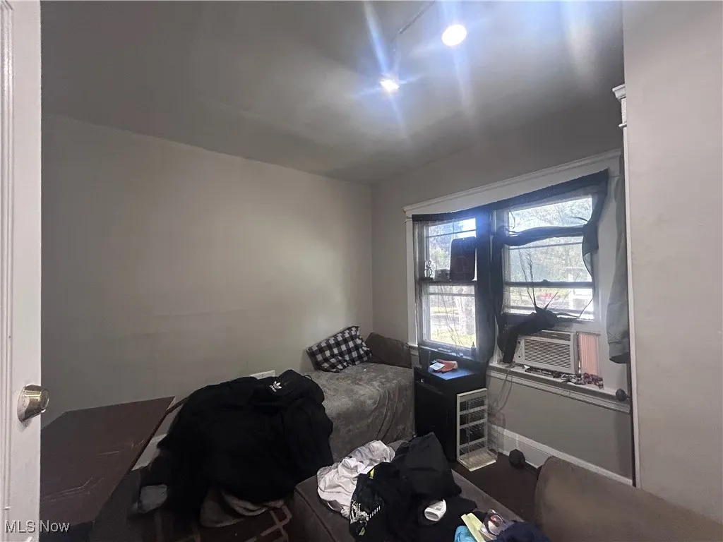 Bedroom with baseboards
