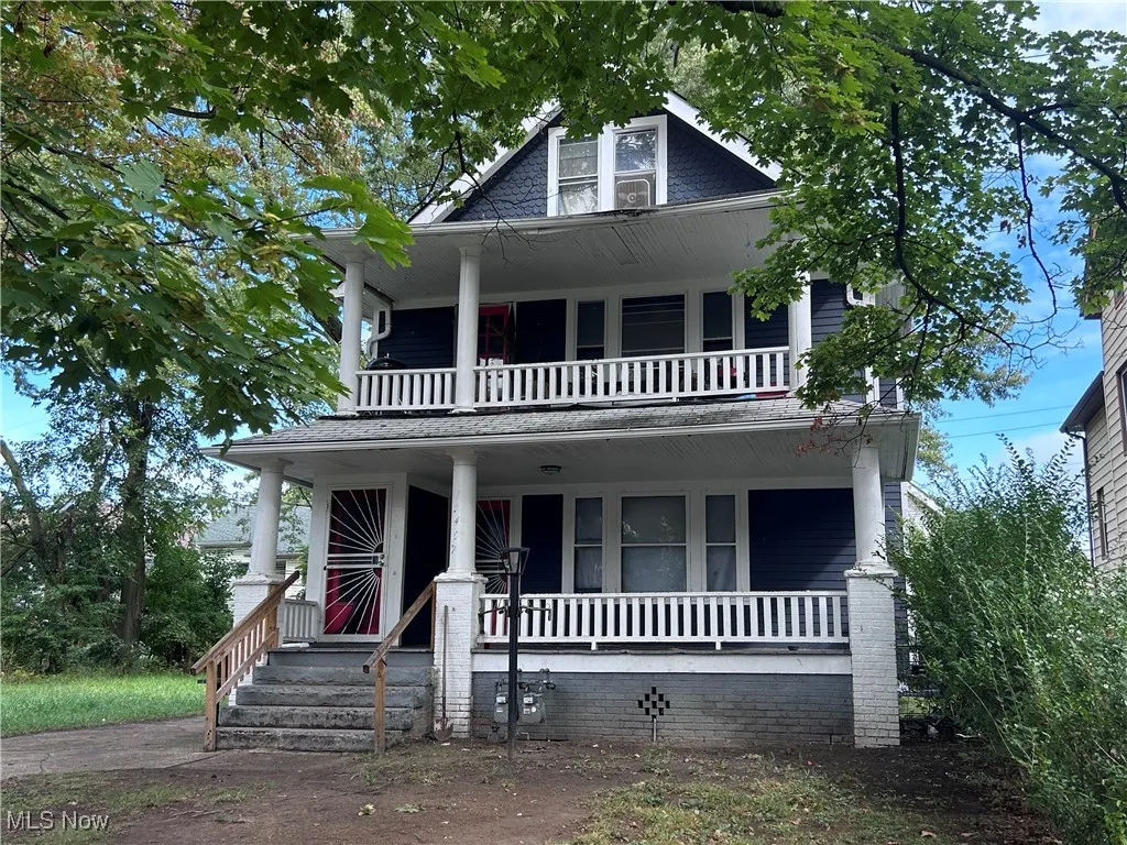 View of front of property with a porch
