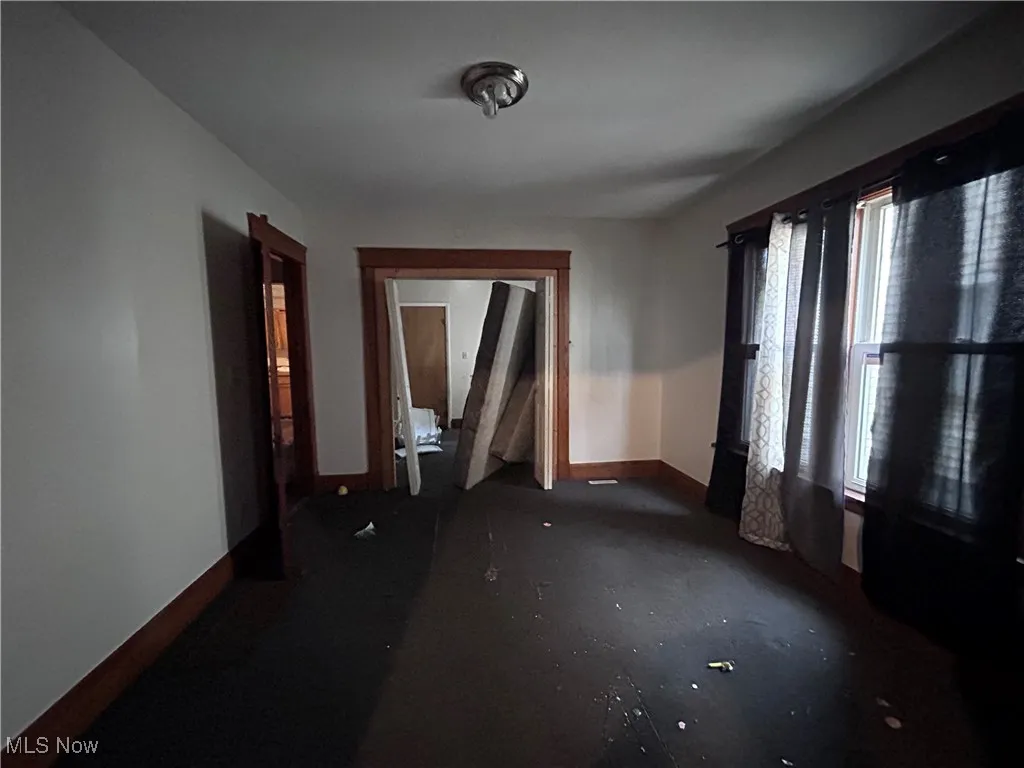 Empty room with baseboards
