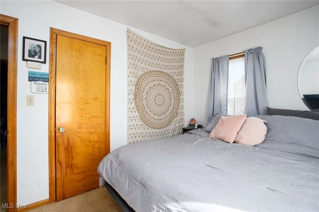 Bedroom featuring carpet