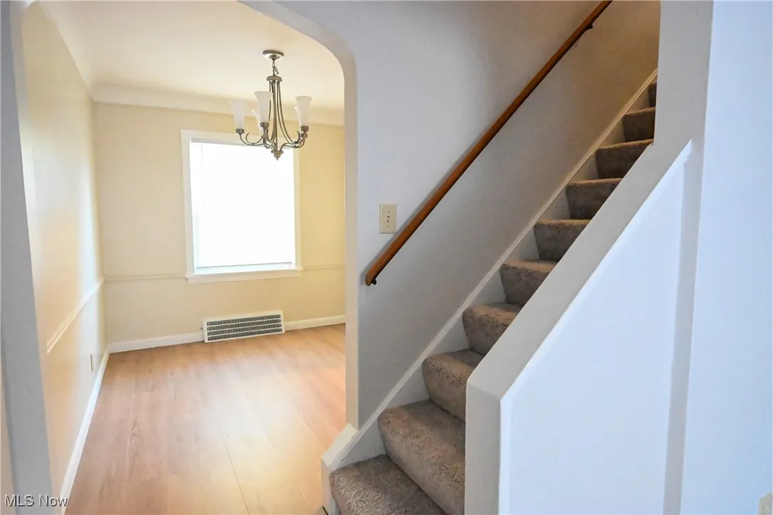 Stairs to second floor bedrooms and bath