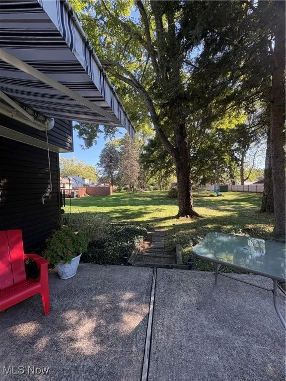 View of yard with a patio