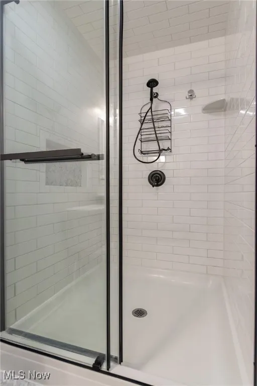 Bathroom with a stall shower
