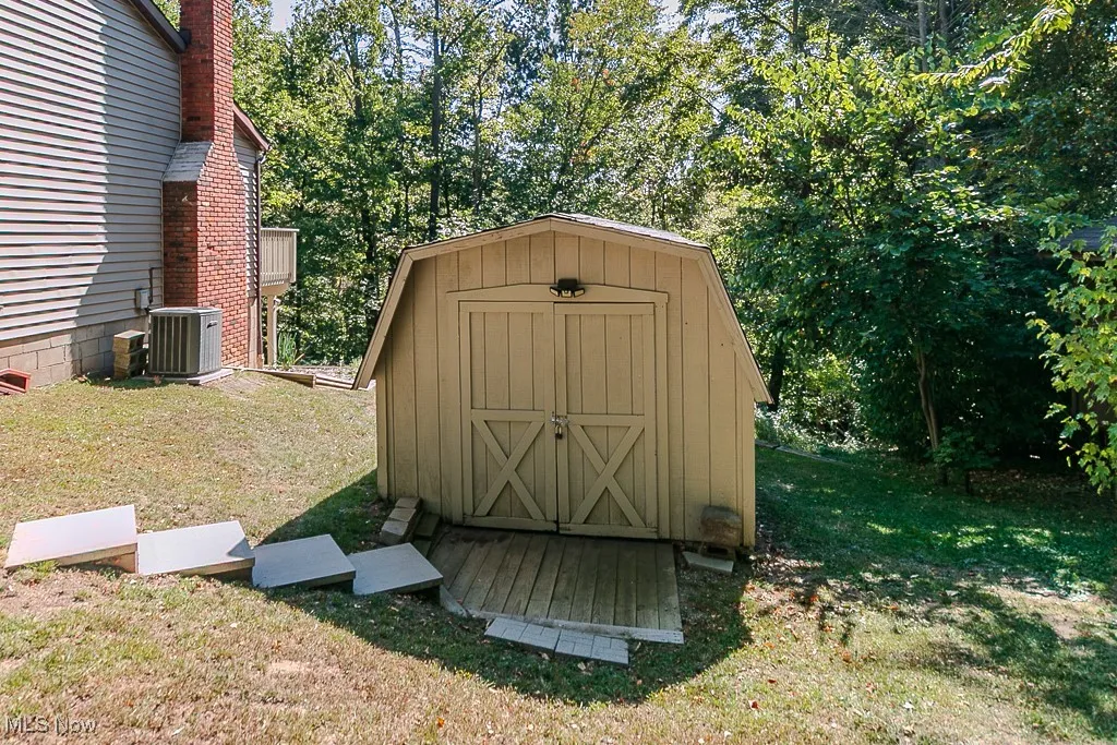 View of shed with view of scattered trees
