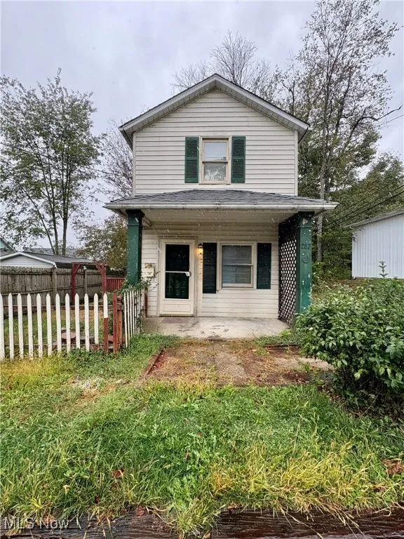 View of front of house featuring covered porch