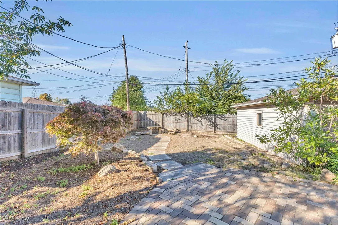 Fenced backyard featuring a patio area