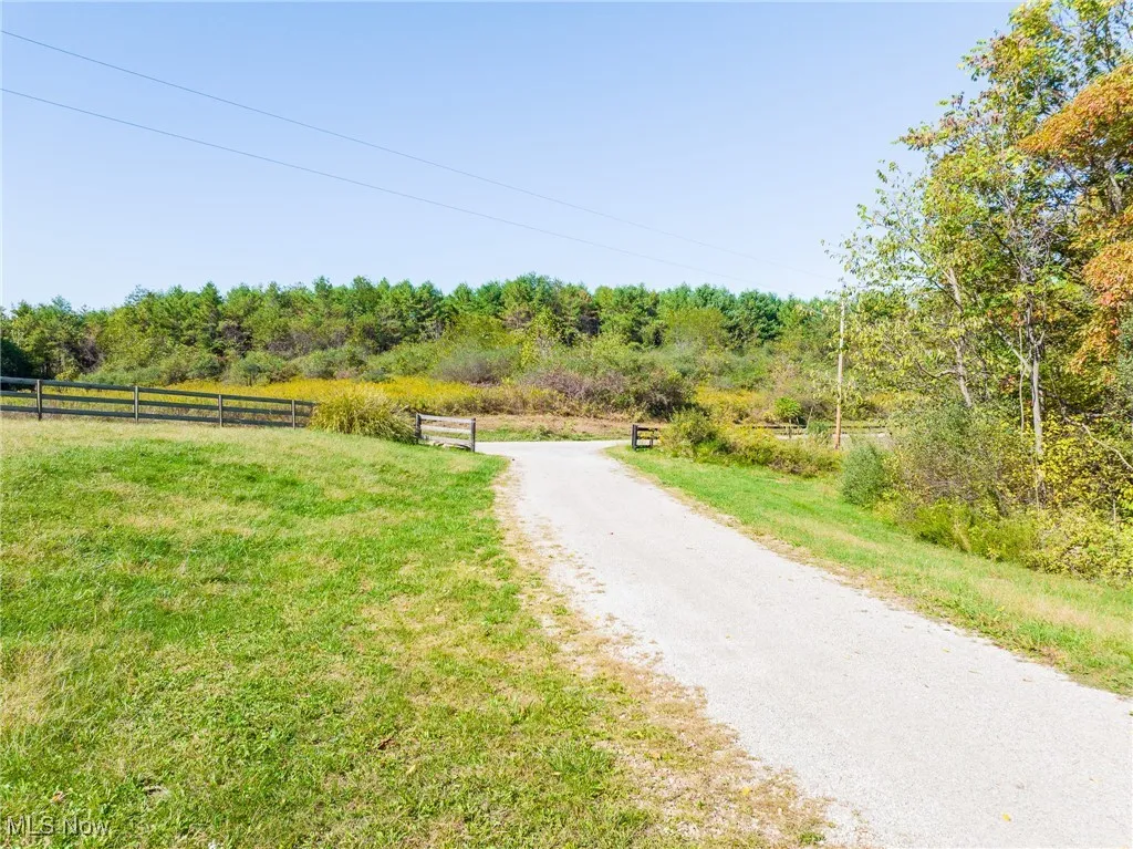 View of street with a view of trees and a view of rural / pastoral area