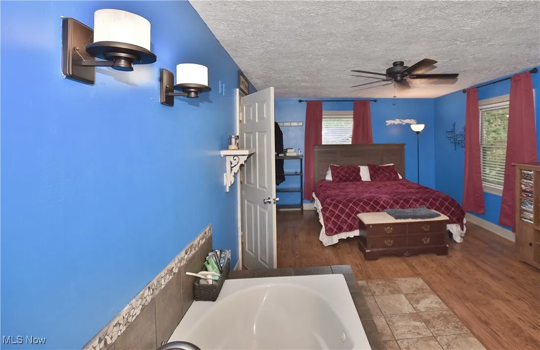 a view of the bedroom from the jetted tub area in the 2nd primary bedroom.