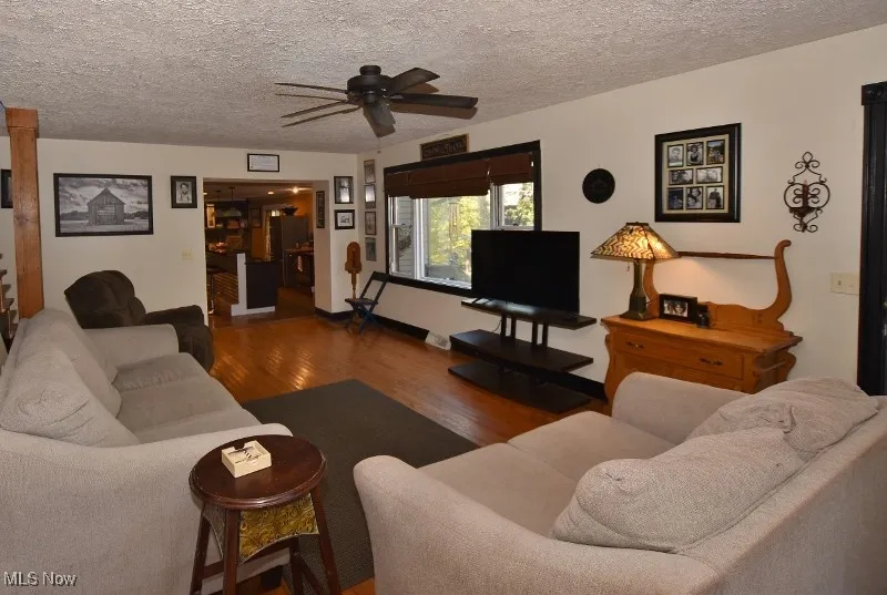 The living room flows into the spacious Kitchen & Dining area