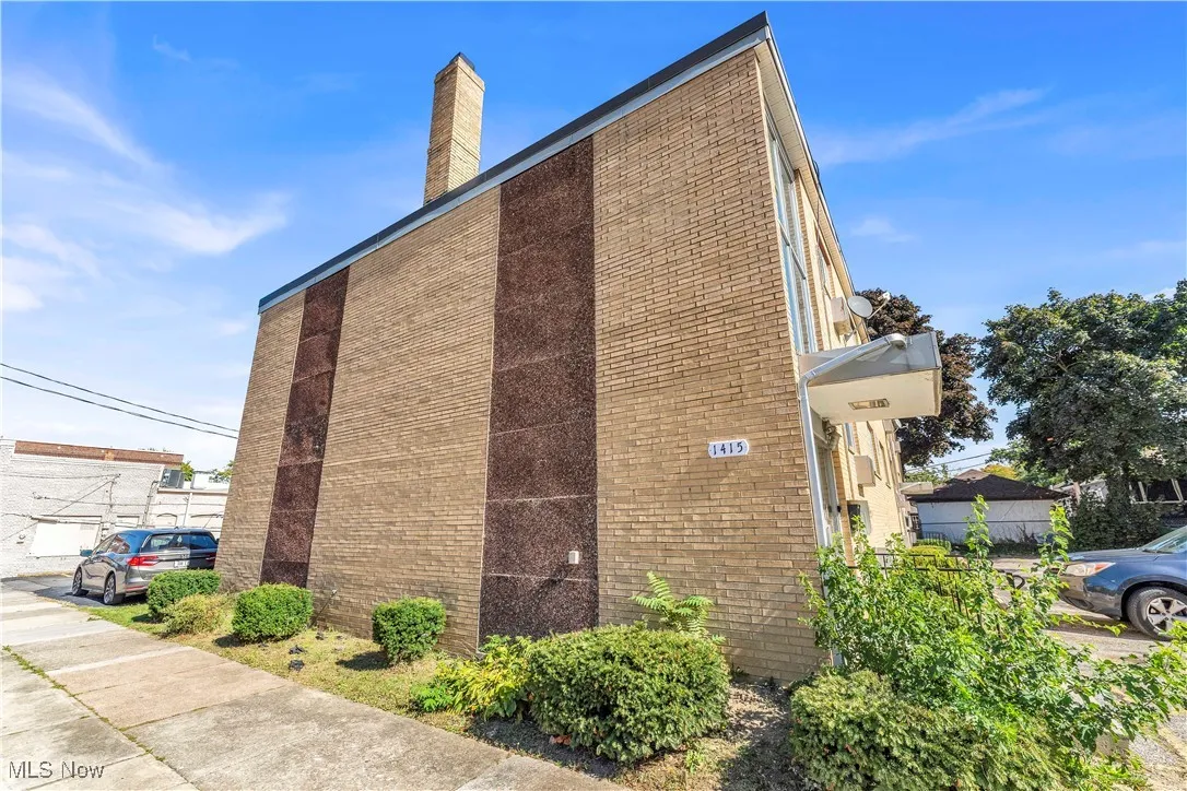 View of home's exterior featuring a chimney