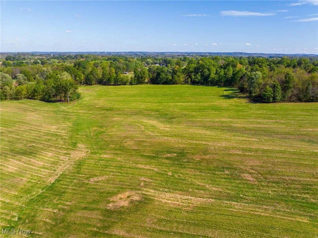 Overview of rural landscape with a heavily wooded area