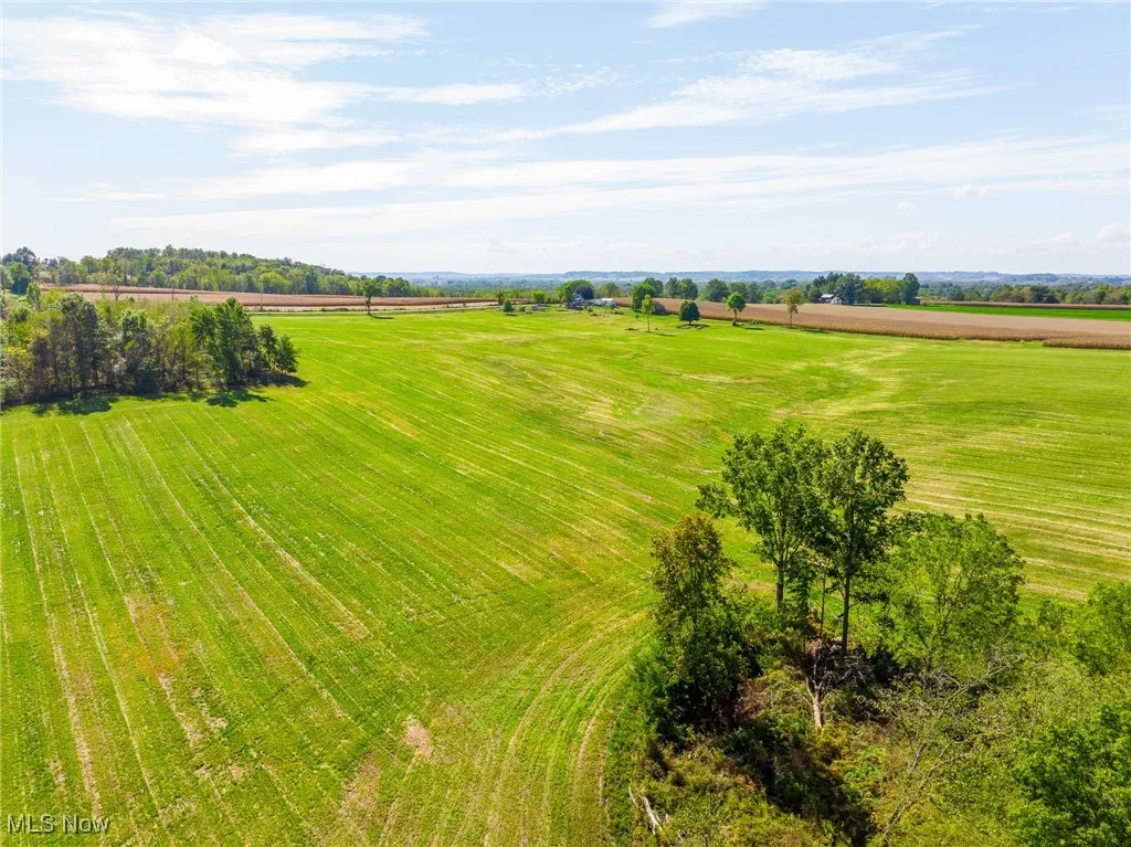 Aerial view of sparsely populated area with extensive farmland