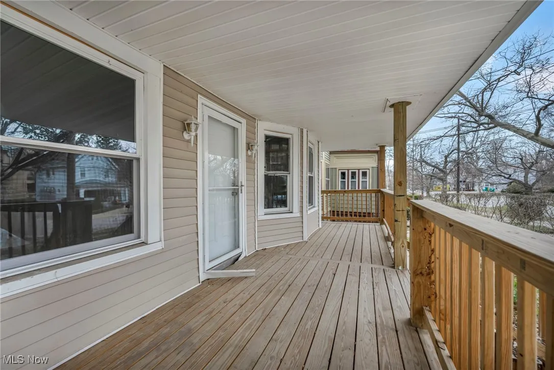 Wooden deck featuring a porch