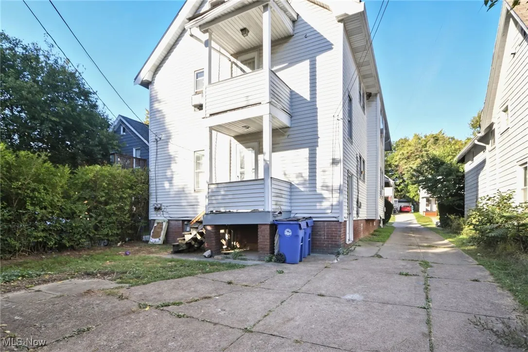 View of home's exterior with a balcony
