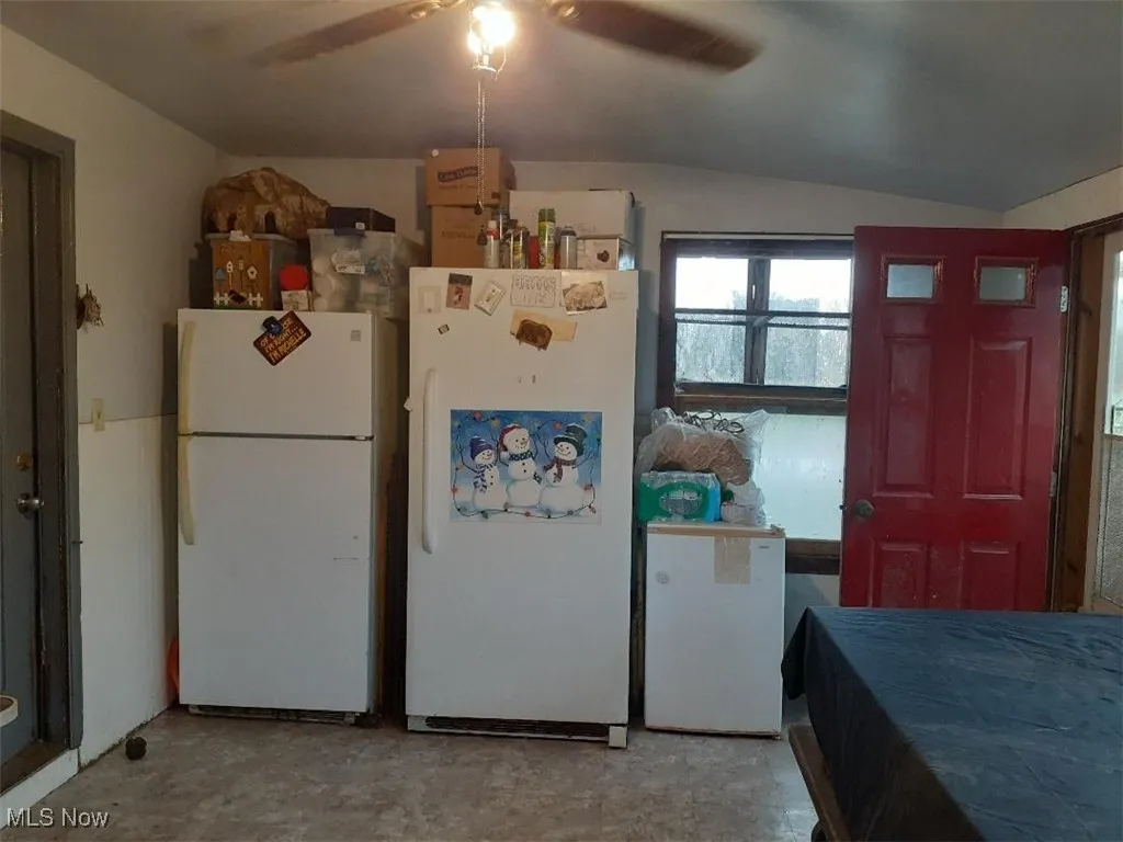 back porch, ceiling fan, and lofted ceiling