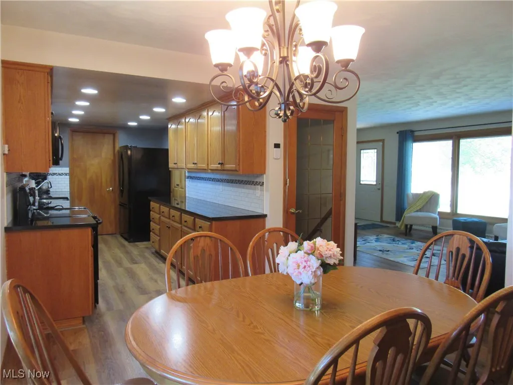 Dining room looking into the living room and kitchen