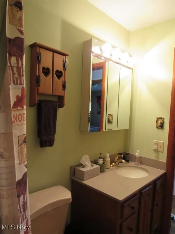 Full bath with vanity/corian and a shower/tub combo