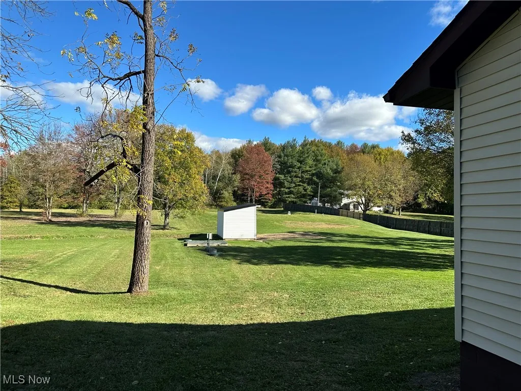 back yard looking out toward pond and 2nd shed