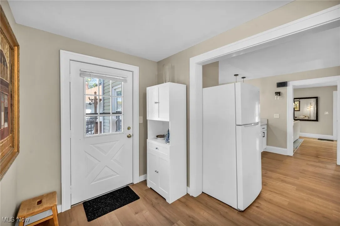 Pantry area and doorway to outside leading to back deck