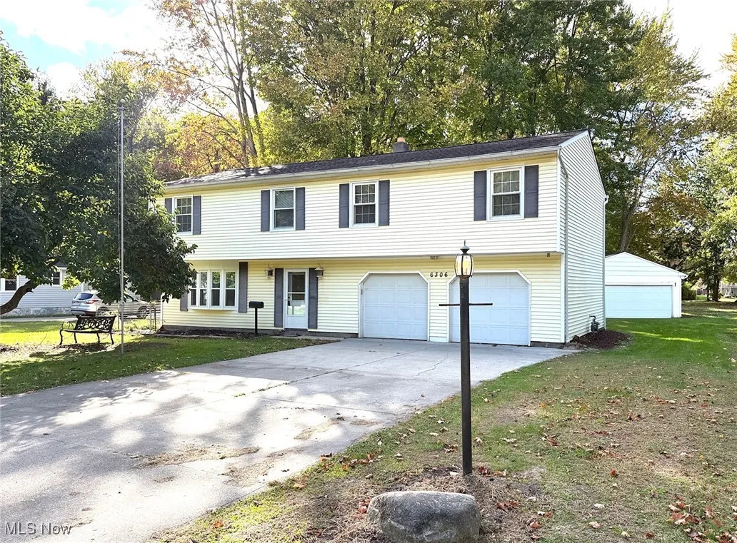 View of Front of home with 2 car attached and 2 car detached garages