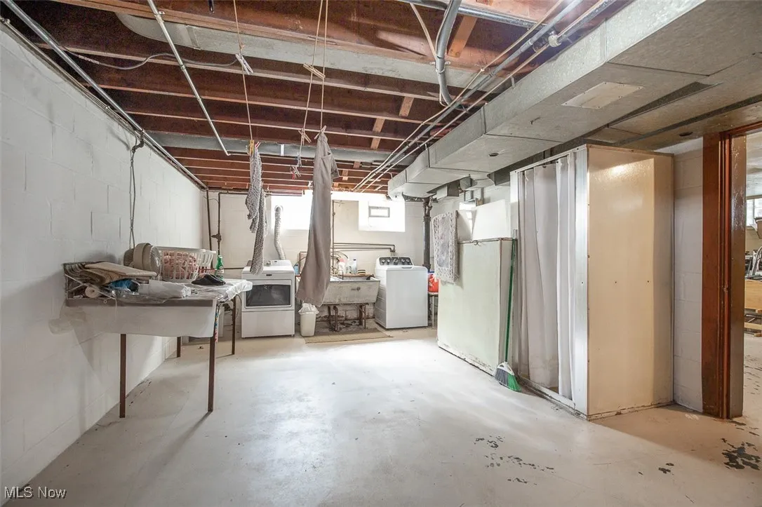 Basement with washer and dryer.