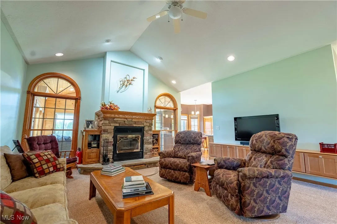 Great Room with cathedral ceiling and wood burning fireplace!