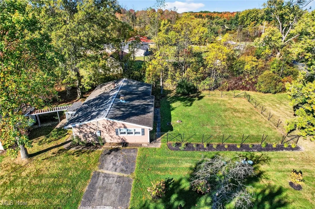 View from above of property featuring a forest